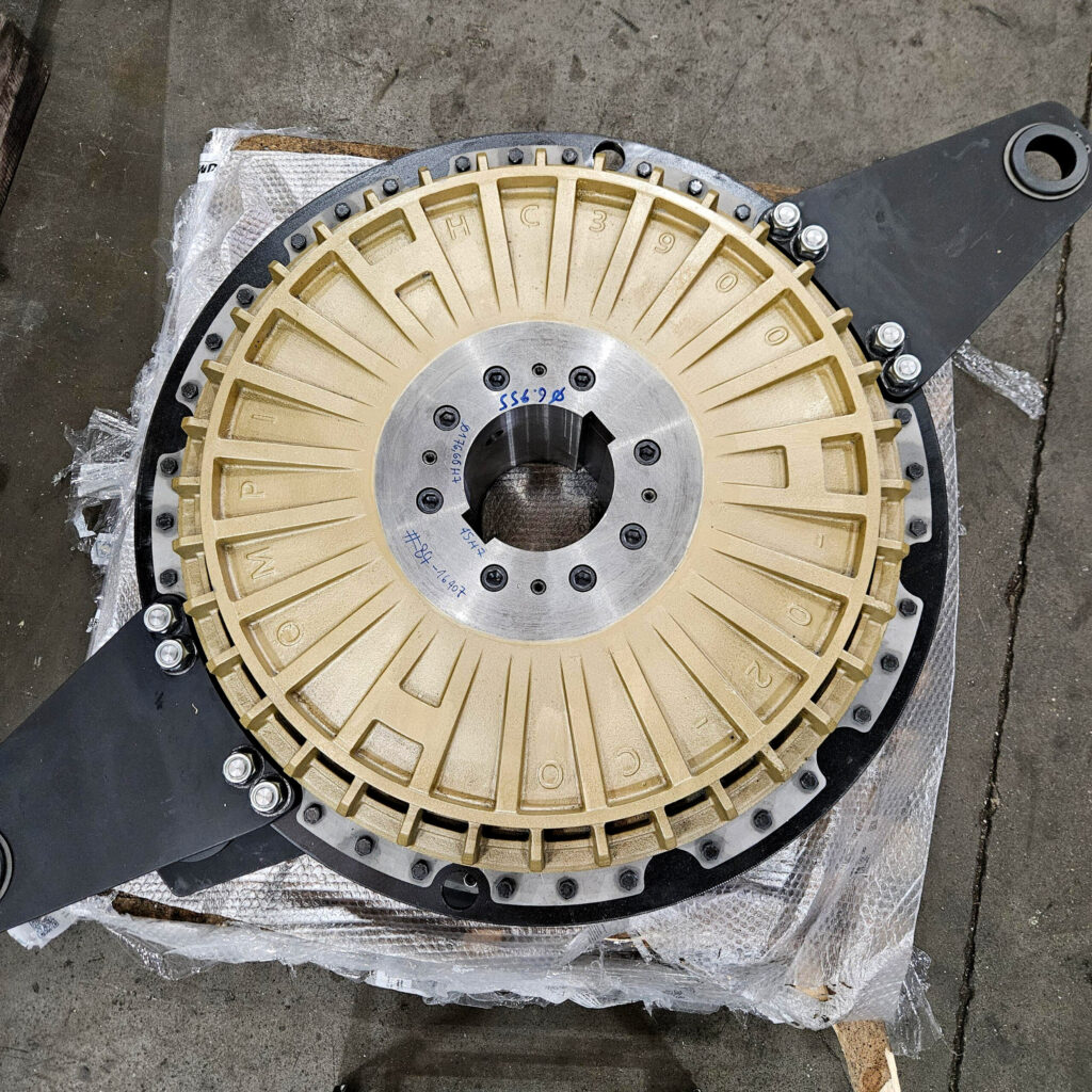 Top view of the HC3900 clutch unit. The clutch is gold, and the underneath is black.